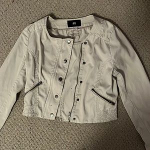 Crème colored asymmetrical jean jacket